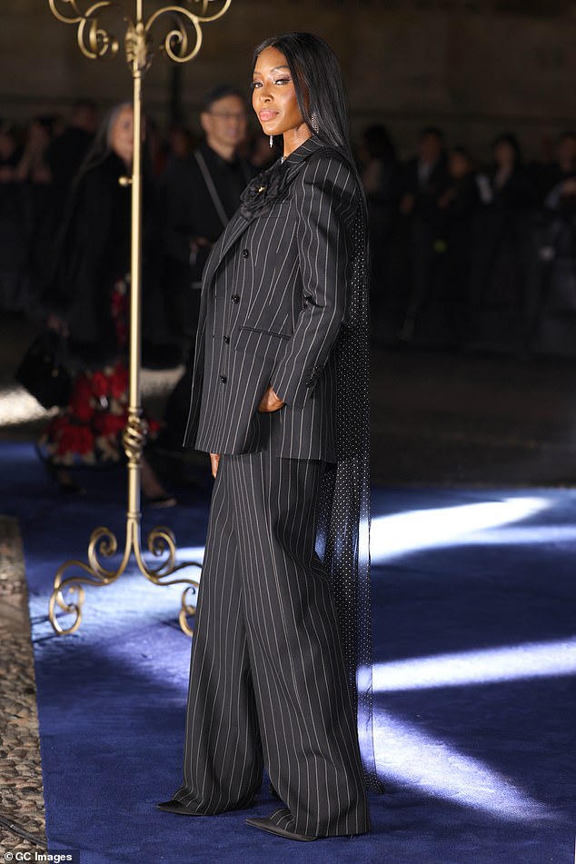 Naomi Campbell looked chic in a pinstripe suit