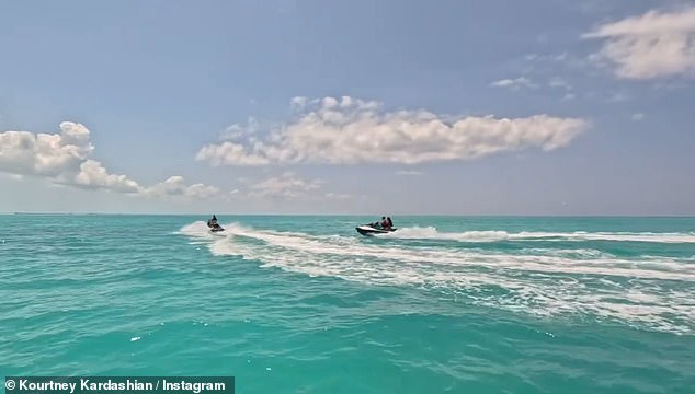 Kourtney uploaded an Instagram video that same day of her and Kim enjoying a jet ski excursion across the sun-drenched Caribbean Sea