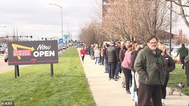 Videos show groups of people bundled in heavy coats and jackets outside a new store in Idaho