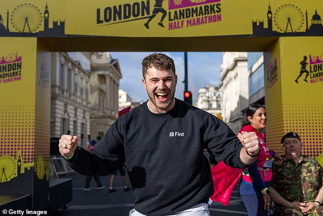 AJ's brother Curtis, 28, looked fit and ready to run the race as he raised his arms in the air with a big grin on his face