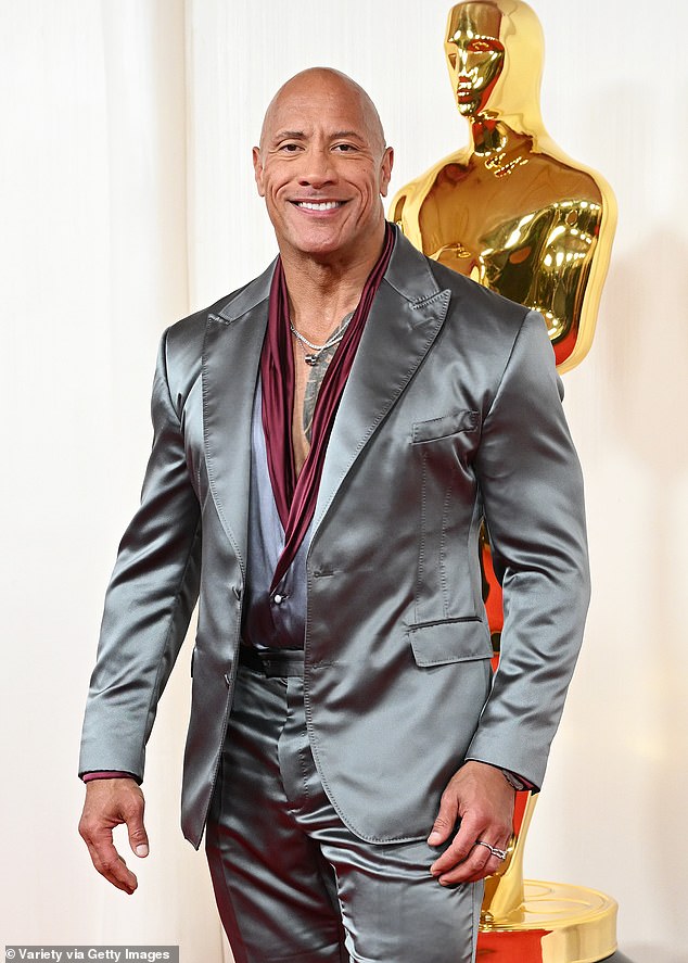 Since retiring from wrestling, Dwayne has become a Hollywood movie star (pictured at the Academy Awards in March)