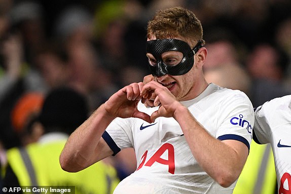 TOPSHOT - Tottenham Hotspur's Swedish midfielder #21, Dejan Kulusevski, celebrates after scoring their second goal during the English Premier League football match between Nottingham Forest and Tottenham Hotspur at The City Ground in Nottingham, central England, on December 15, 2023 .(Photo by Oli SCARFF / AFP) / RESTRICTED TO EDITORIAL USE.  No use of unauthorized audio, video, data, fixtures, club/league logos or 'live' services.  Online use during competitions limited to 120 images.  An additional 40 images can be used in the additional time.  No video emulation.  Use of social media during competitions is limited to 120 images.  An additional 40 images can be used in the additional time.  No use in betting, competition or individual club/competition/player publications.  / (Photo by OLI SCARFF/AFP via Getty Images)