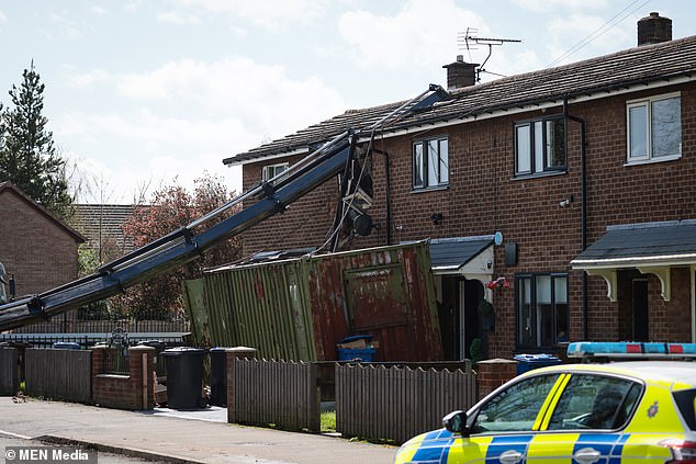 According to reports, the truck supporting the crane overturned on the road while trying to remove a green container from a playing field