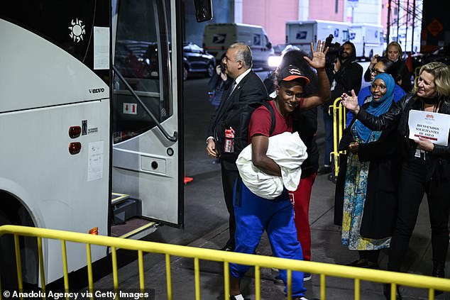 A bus carrying migrants from Texas arrives at the Port Authority bus station in New York, United States