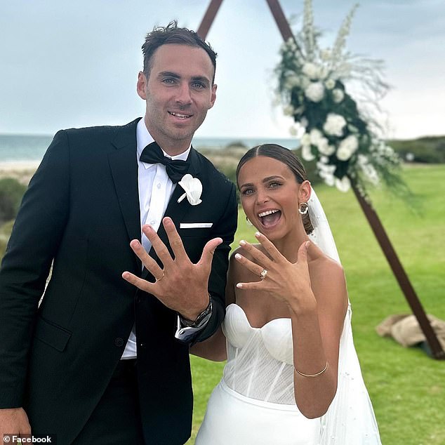 Finlayson (pictured with his wife Kellie) issued a groveling apology after the match and also spoke to his victim on the pitch