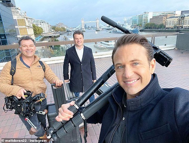 Matt Doran shared a selfie on Instagram on the day of the interview, showing producer Taylor Auerbach grinning next to a cameraman with Tower Bridge in the background (pictured)