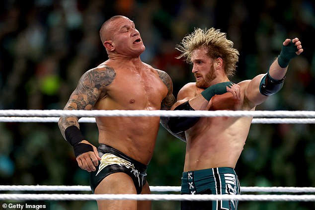 Paul fought in a menace match against Randy Orton (pictured left) and Kevin Owens