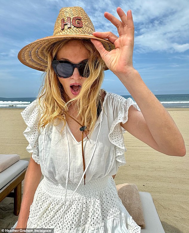 In the snap, the veteran actress pulled a surprised face as she wore a personalized straw hat with her initials stitched on it.