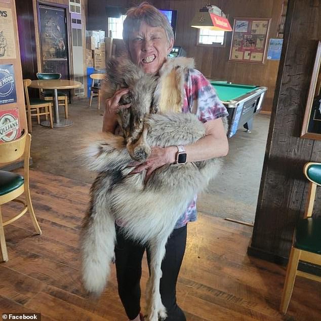 1712555744 19 Wyoming hunter 42 poses with exhausted wolf he tortured and