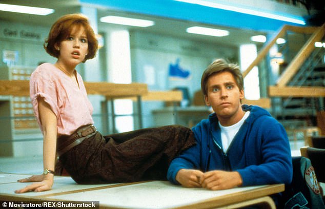 The actress as high school student Claire Standish with co-star Emilio Estevez as athlete Andrew Clark in director John Hughes' 1987 classic The Breakfast Club