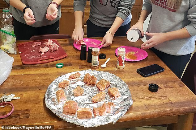 Later, students learned how to cull, defeather and remove chicken organs and feet before marinating and placing them in the oven.