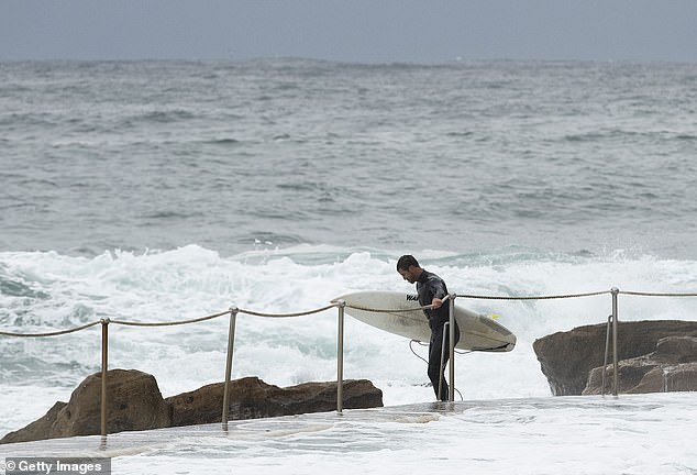 Johns enjoys a lifestyle that includes surfing, yoga and healthy eating