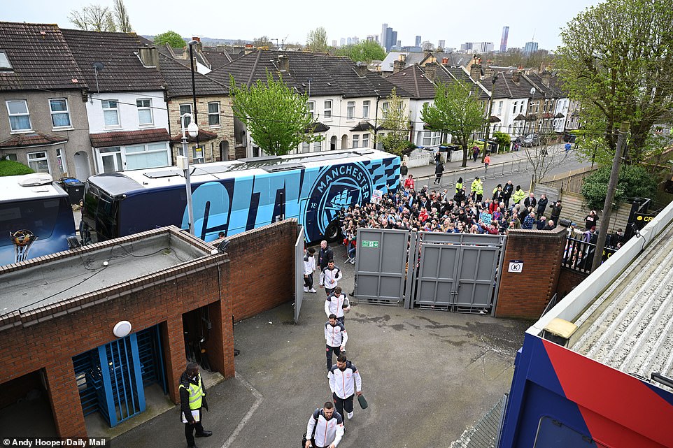 A small crowd gathered around the City bus after it arrived at the ground, with players streaming through the gates