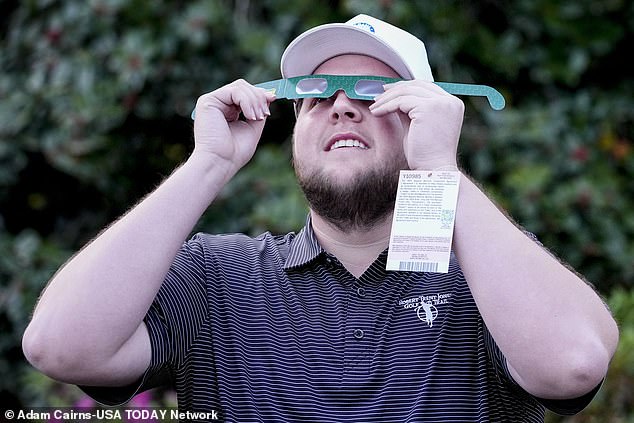 Tournament organizers instructed participants to protect their eyes during Monday's eclipse