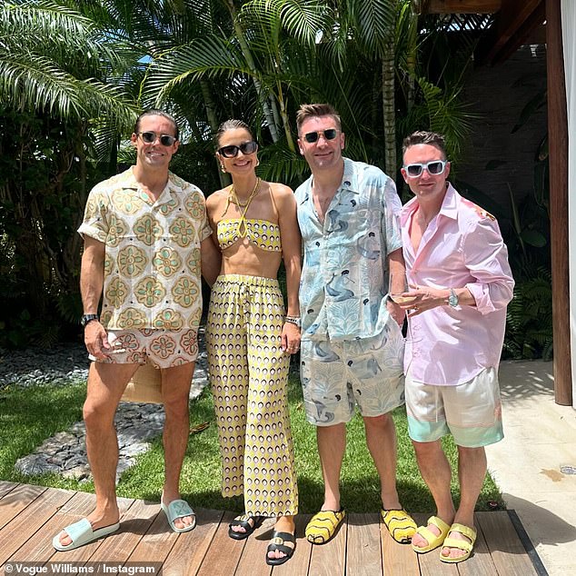 In another photo with the same couple, they were all dressed up for dinner, while Vogue donned a geometric print co-ord set with a stylish halter neck top