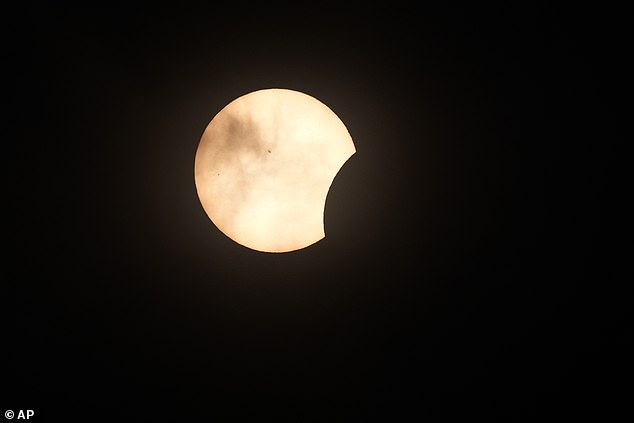 FORT WORTH, TEXAS: The solar eclipse moves through Texas