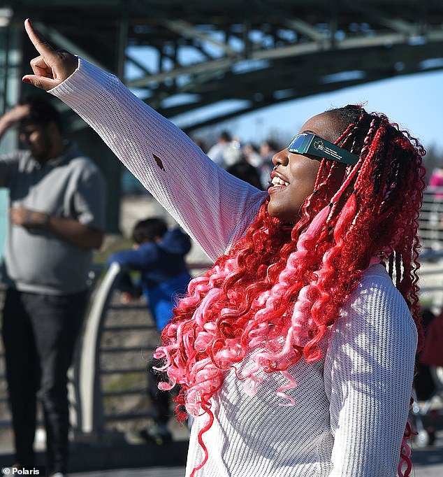 Tourists are anticipating the eclipse as far north as New York's Niagara Falls State Park – and many have already stepped outside to get the best viewing spot