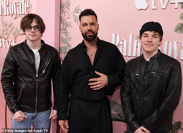 Ricky pictured with twin sons Valentino and Matteo Martin, 15, whom he welcomed via surrogacy in 2008