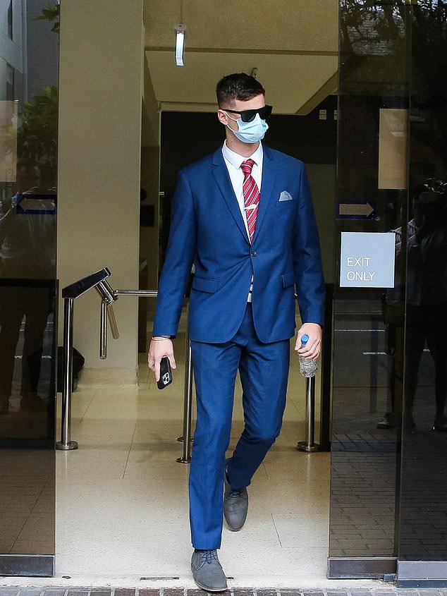 Dominik Sieben (pictured outside court) told police he was just drinking a beer and trying to cheer on his team when he reportedly gave the salute