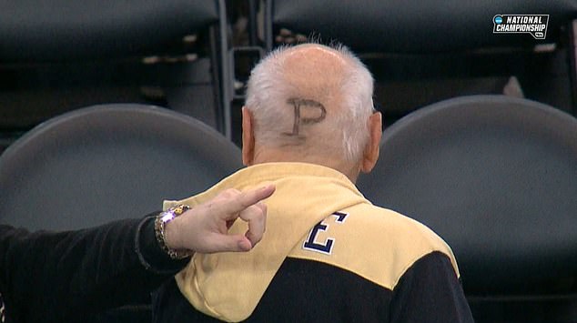 The 87-year-old took off his cap to reveal the letter 'P' shaved into the back of his hair