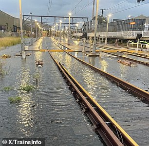 Train tracks along the city's South Cost line were seen partially submerged after the weekend's deluge