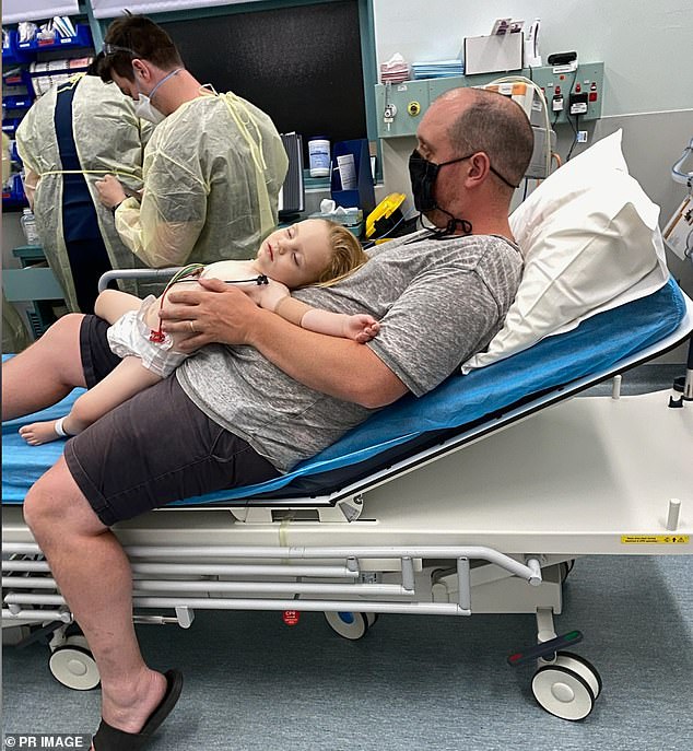 Despite Noah Souvatzis (pictured with his father Ben) vomiting during his discharge from hospital, he was sent home.  The toddler's condition worsened and his parents returned him hours later