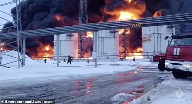 A devastating fire is seen following a Ukrainian kamikaze drone attack on an oil depot in Klintsy, Russia's Bryansk region