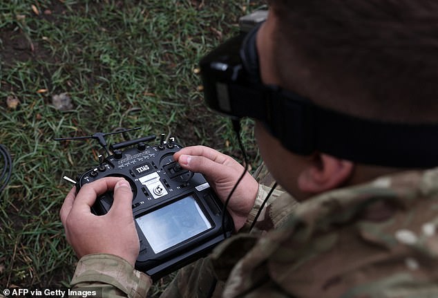 A Ukrainian FPV (first-person view) drone operator trains not far from the front line in the Donetsk region on November 16, 2023