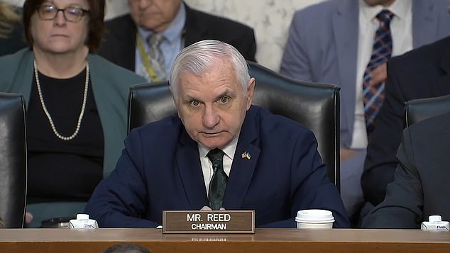 Senate Armed Services Committee Chairman Jack Reed told Capitol Police to escort protesters from the hearing.  When another group of protesters began interrupting proceedings, he demanded that they also be escorted out by authorities