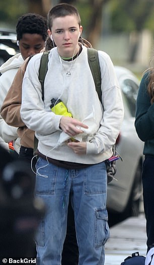 In February, Fin wore a fresh buzz cut and carried a backpack with the name FIN embroidered on it as mom Jennifer kissed them goodbye