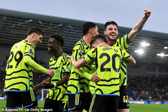 BRIGHTON, ENGLAND – APRIL 06: Kai Havertz of Arsenal celebrates scoring his team's second goal with teammates during the Premier League match between Brighton & Hove Albion and Arsenal FC at the American Express Community Stadium on April 6, 2024 in Brighton, England.  (Photo by Stuart MacFarlane/Arsenal FC via Getty Images)