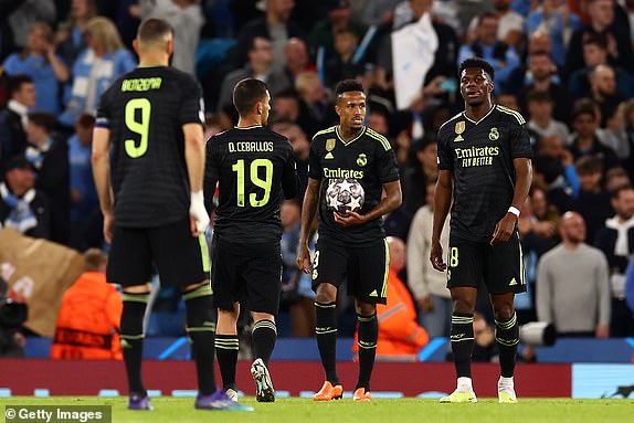 MANCHESTER, ENGLAND - MAY 17: Real Madrid's Eder Militao and his teammates look dejected during the UEFA Champions League semi-final second leg between Manchester City FC and Real Madrid at Etihad Stadium on May 17, 2023 in Manchester, United Kingdom.  (Photo by Chris Brunskill/Fantasista/Getty Images)