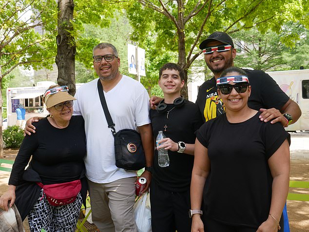 (From left to right) Lilliana Atencio, Erick DA' Costa, Stefano DA' Costa and Paola Sosa traveled from Costa Rica to view the solar eclipse from Klyde Warren Park in Dallas, Texas