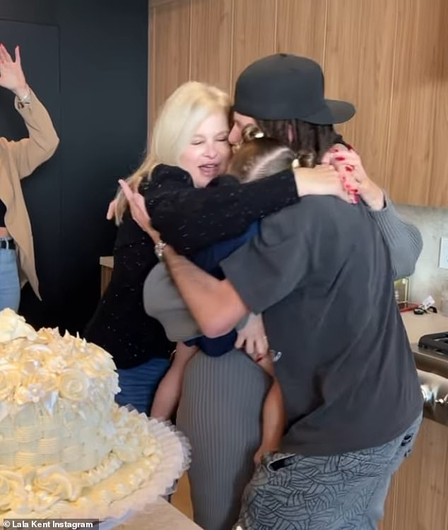 In the shot, she can be seen watching her brother, Easton Burningham, being cut into a vanilla cake, before excitedly announcing that the frosting inside is pink, indicating that his three-year-old niece, Ocean, is having a baby sister.