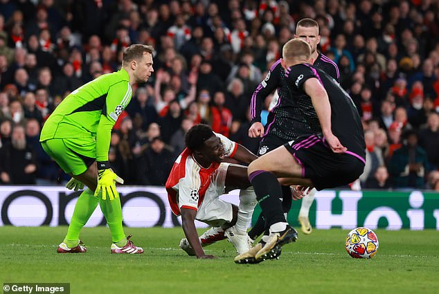 Goalkeeper Manuel Neuer appeared to take down Saka, but the referee waved it away