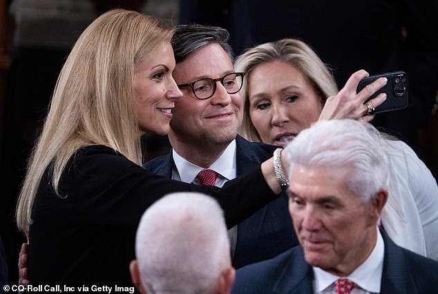 Reps. Mike Johnson, R-La., speaker nominee, Beth Van Duyne, R-Texas, left, and Marjorie Taylor Greene, R-Ga., are seen on the House floor of the U.S. Capitol before Johnson was elected chairman of the House of Representatives on Wednesday, October 25, 2023