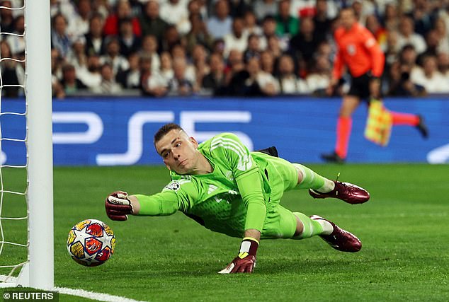 Real Madrid's Andriy Lunin was out of position and couldn't prevent the shot