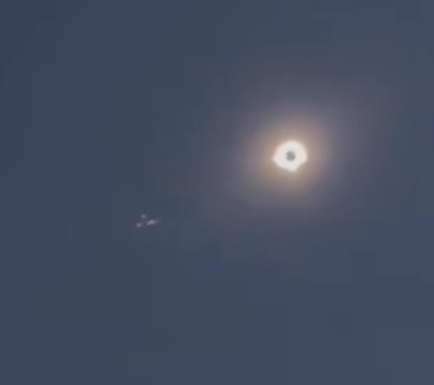 But eclipse spectators saw another plane fly over the event in McKinney, about 50 miles from Arlington.