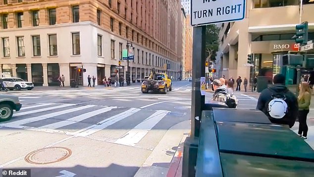 The bright yellow tow truck is seen chasing the car after it tried to snatch the vehicle and driver off the street