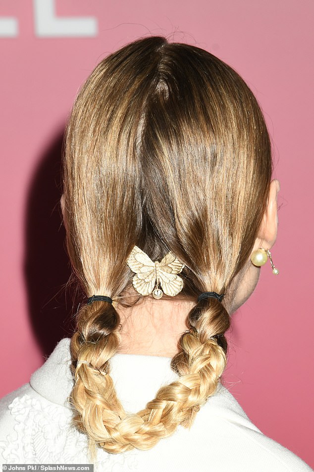 The Oxford graduate wore her hair in a loop braid, complete with a butterfly clip