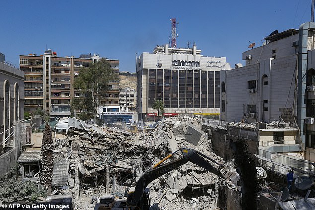 The rubble of a building belonging to the Iranian embassy is pictured a day after an airstrike in Damascus on April 2, 2024