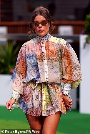 Print perfectly!  One racing fan donned a chic shirt dress with a bold hemline for the occasion