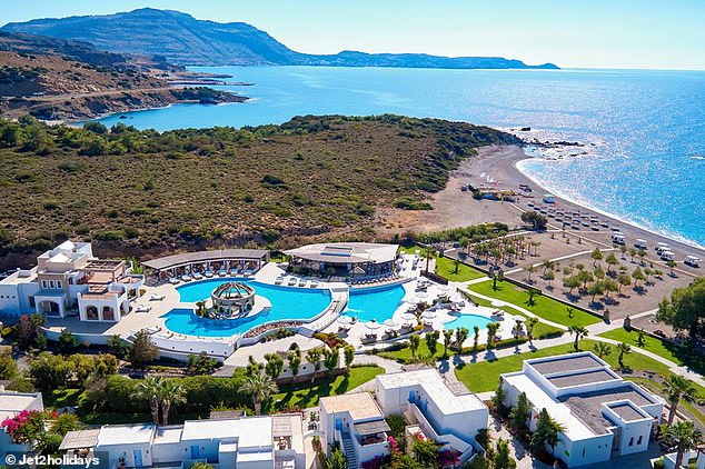 Before the fires: The Lindian Village Beach Resort in Rhodes can be seen in this aerial photo on the Jet2Holidays website, which shows what the pool looked like before the July bushfires