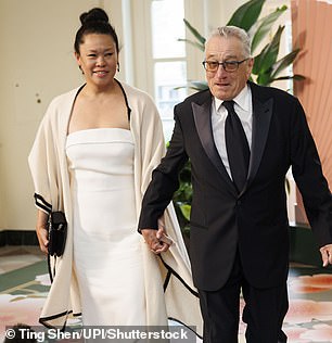 Other famous attendees included Robert De Niro and his girlfriend Tiffany Chen (seen), and former President Bill Clinton and his wife Hillary Clinton