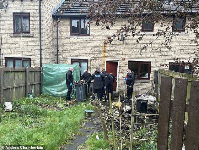 Officers stormed a housing association building in Burnley on Sunday and carried out a thorough search of the garden on Monday.