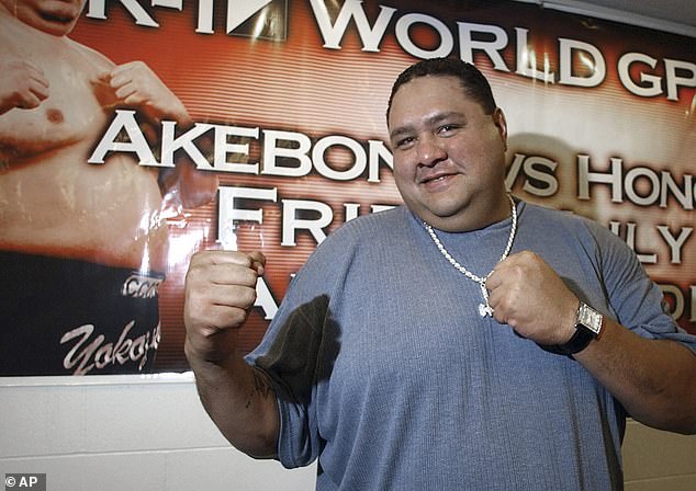 Akebono poses for a photo during a press conference at Aloha Stadium in Honolulu in 2005