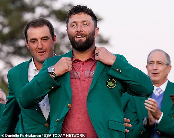 Jon Rahm dons the traditional green jacket after winning the 2023 Masters.