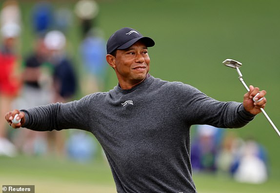 Golf - The Masters - Augusta National Golf Club, Augusta, Georgia, USA - April 9, 2024 Tiger Woods of the USA reacts to the green on the 9th hole during a practice round REUTERS/Mike Blake