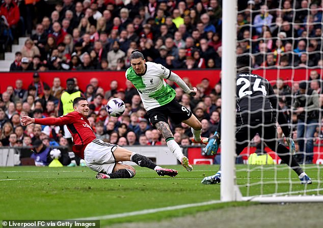 Darwin Nunez fires the ball across goal to no one during his frustrating display at Old Trafford