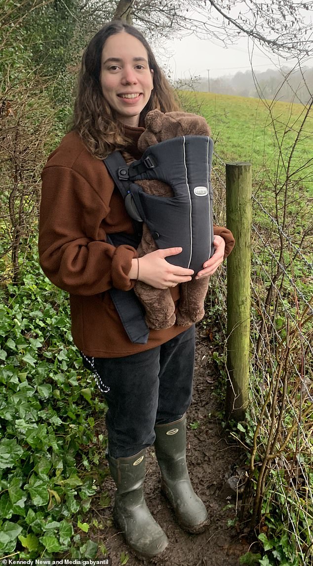 Gabriela is shown lovingly holding her son as a baby.  He is now two years old and she says her nose still hasn't fully returned to its former state